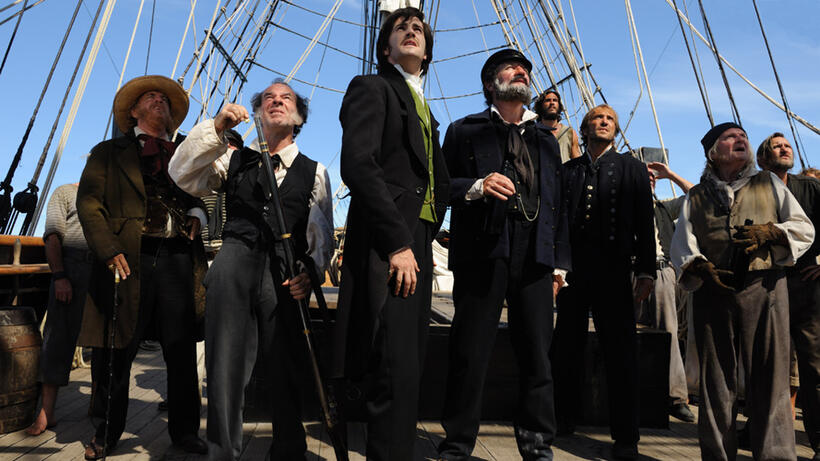 Tom Hanks as Dr. Henry Goose, Jim Sturgess as Adam Ewing, Jim Broadbent as Captain Molyneux in "Cloud Atlas."