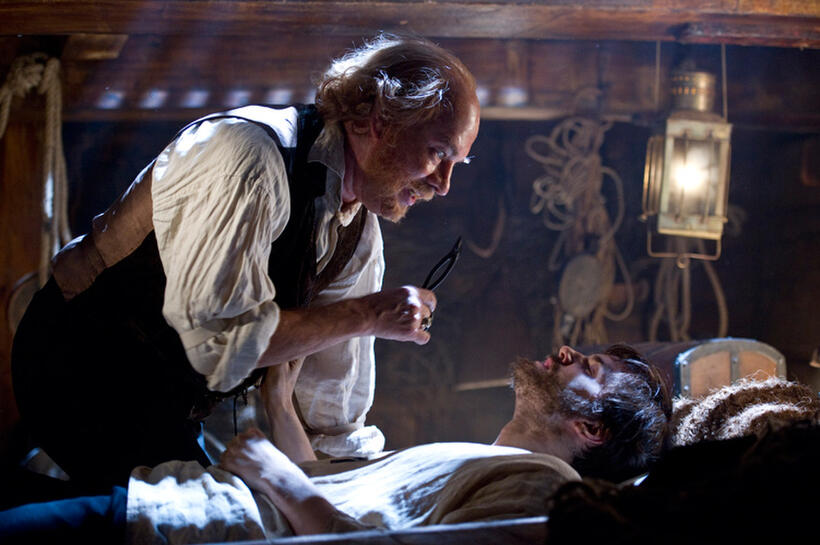 Tom Hanks as Dr. Goose and Jim Sturgess as Adam Ewing in "Cloud Atlas."