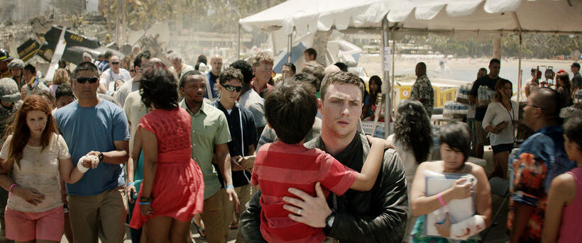 Aaron Johnson as Ford Brody and Jake Cunanan as Akio in "Godzilla."