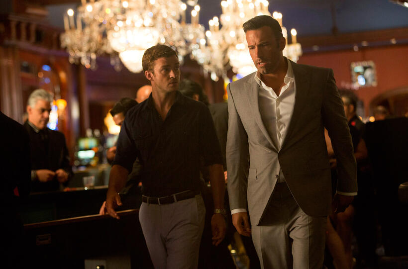 Justin Timberlake as Richie Furst and Ben Affleck as Ivan Block in "Runner, Runner."