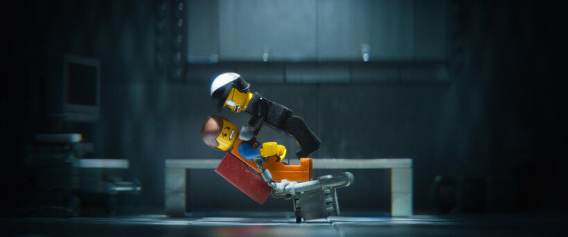 Emmet voiced by Chris Pratt and Bad Cop/Good Cop voiced by Liam Neeson in "The LEGO Movie."