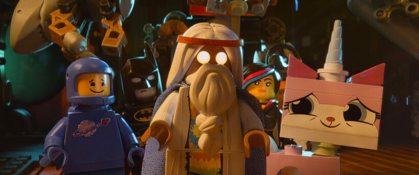 Benny voiced by Charlie Day, Batman voiced by Will Arnett, Vitruvius voiced by Morgan Freeman, Wyldstyle voiced by Elizabeth Banks and Unikitty voiced by Alison Brie in "The LEGO Movie."