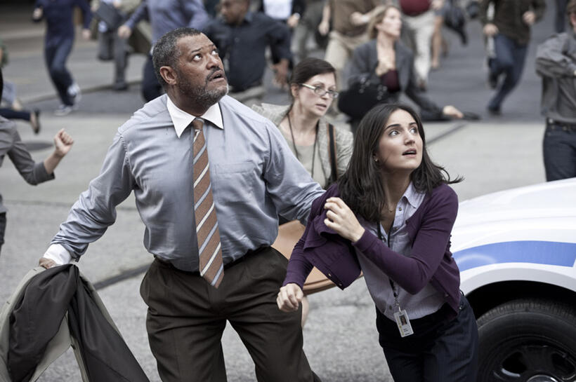 Laurence Fishburne as Perry White and Rebecca Buller as Jenny in "Man of Steel."