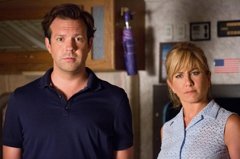 Jason Sudeikis as David Clark and Jennifer Aniston as Rose O'Reilly in "We're the Millers."