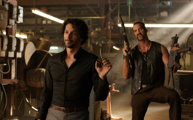 Tomer Sisley as Pablo Chacon and Matthew Willig as One-Eye in "We're the Millers."