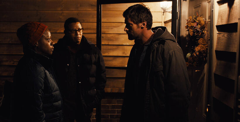 Viola Davis as Nancy Birch, Terrence Howard as Franklin Birch and Hugh Jackman as Keller Dover in "Prisoners."