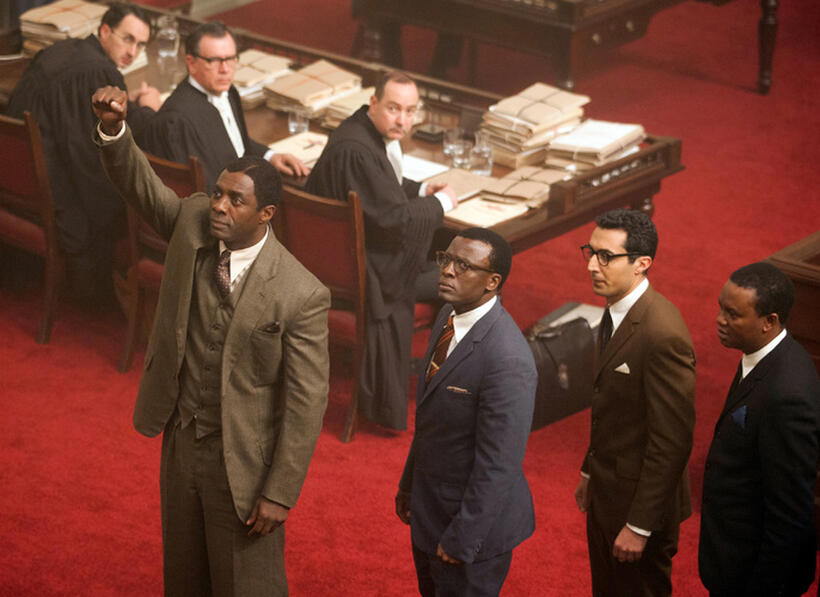 Idris Elba, Tony Kgoroge, Riaad Moosa and Thapelo Mokoena in "Mandela: Long Walk to Freedom."