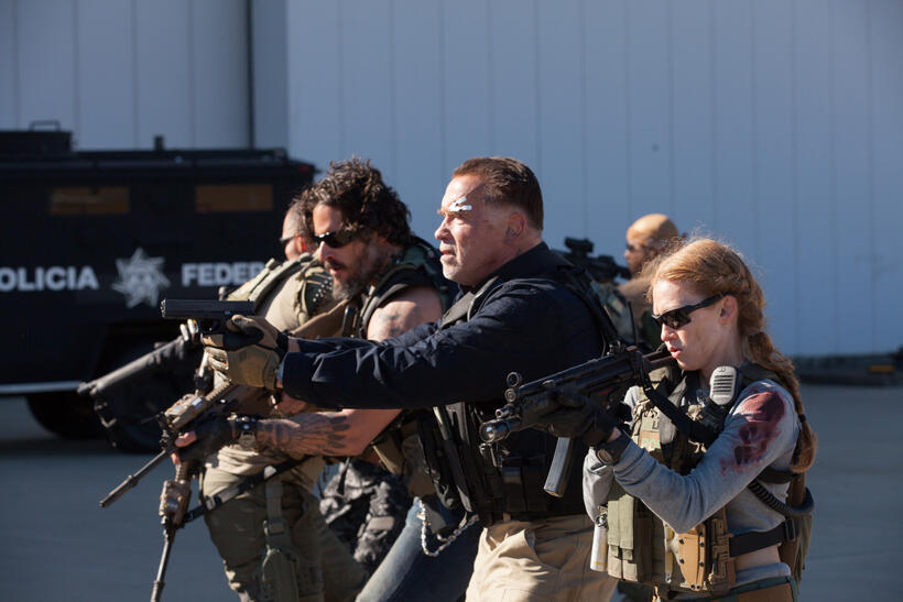 Joe Manganiello as Grinder, Arnold Schwarzenegger as Breacher and Mireille Enos as Lizzy in "Sabotage."