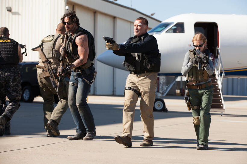 Joe Manganiello as Grinder, Arnold Schwarzenegger as Breacher and Mireille Enos as Lizzy in "Sabotage."