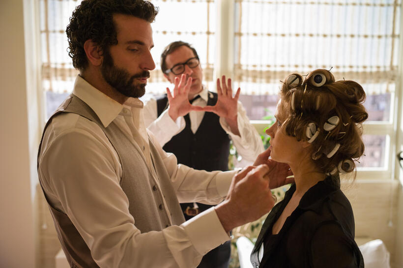 Bradley Cooper, director David O. Russell and Amy Adams on the set of "American Hustle."