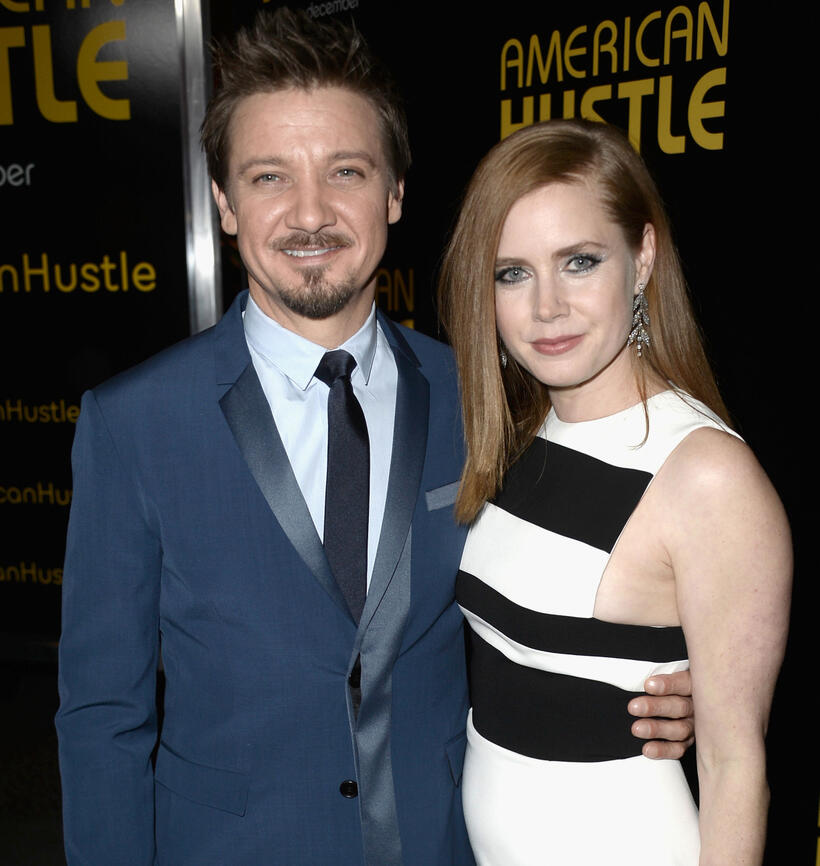 Jeremy Renner and Amy Adams at the Los Angeles premiere of "American Hustle."