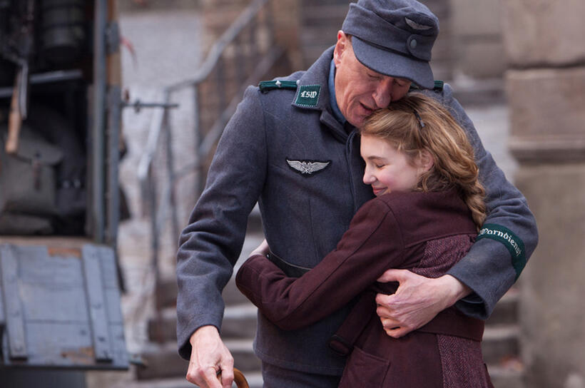 Sophie Nelisse as Liesel and Geoffrey Rush as Hans in "The Book Thief."