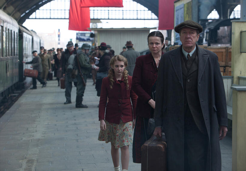Sophie Nelisse as Liesel, Emily Watson as Rosa and Geoffrey Rush as Hans in "The Book Thief."