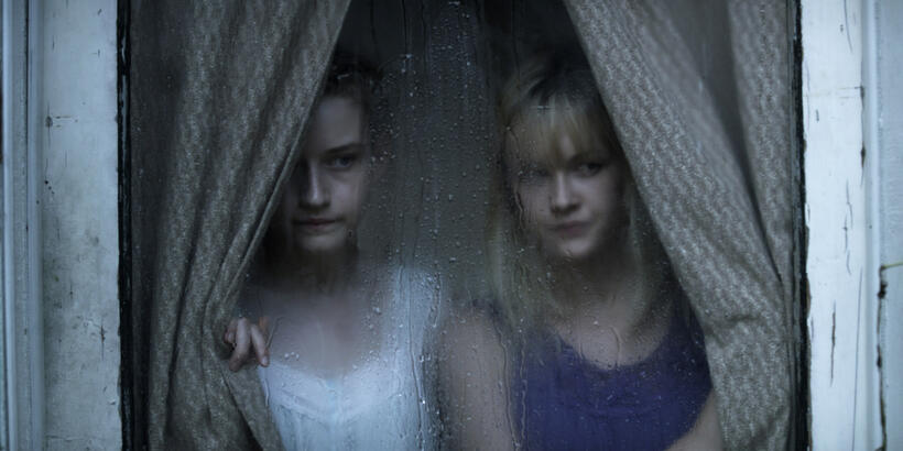 Julia Garner as Rose Parker and Ambyr Childers as Iris Parker in "We Are What We Are."