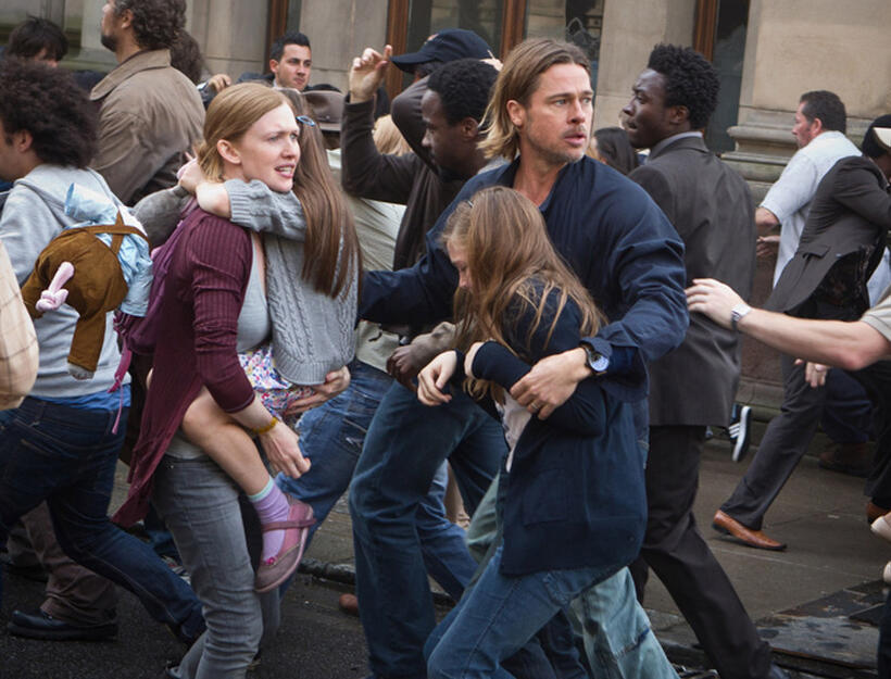Mireille Enos as Karin, Sterling Jerins as Connie and Brad Pitt as Gerry Lane in "World War Z."
