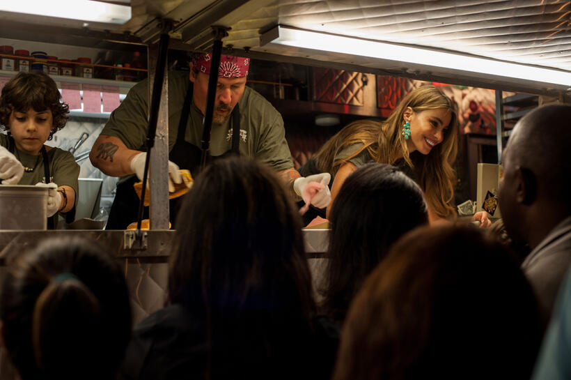 Emjay Anthony as Percy Casper, Jon Favreau as Carl Casper and Sofia Vergara as Inez in "Chef."