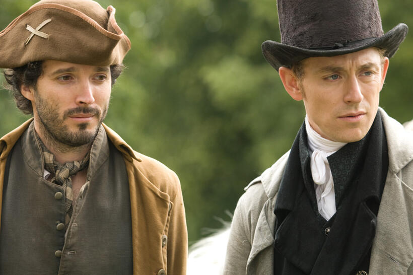 Bret McKenzie as Martin and JJ Feild as Mr. Henry Nobley in "Austenland."