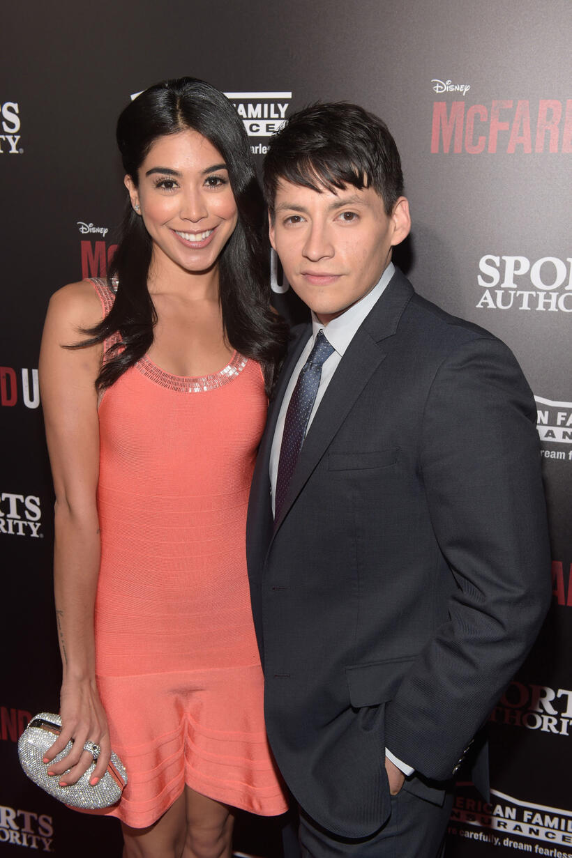 Carlos Pratts and guest at the California premiere of "McFarland, USA."