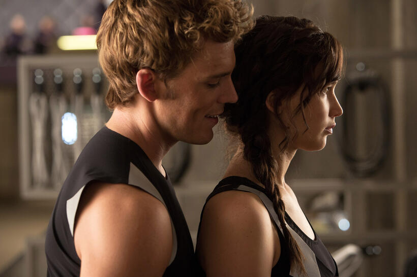 Sam Claflin as Finnick Odair and Jennifer Lawrence as Katniss Everdeen in "The Hunger Games: Catching Fire."