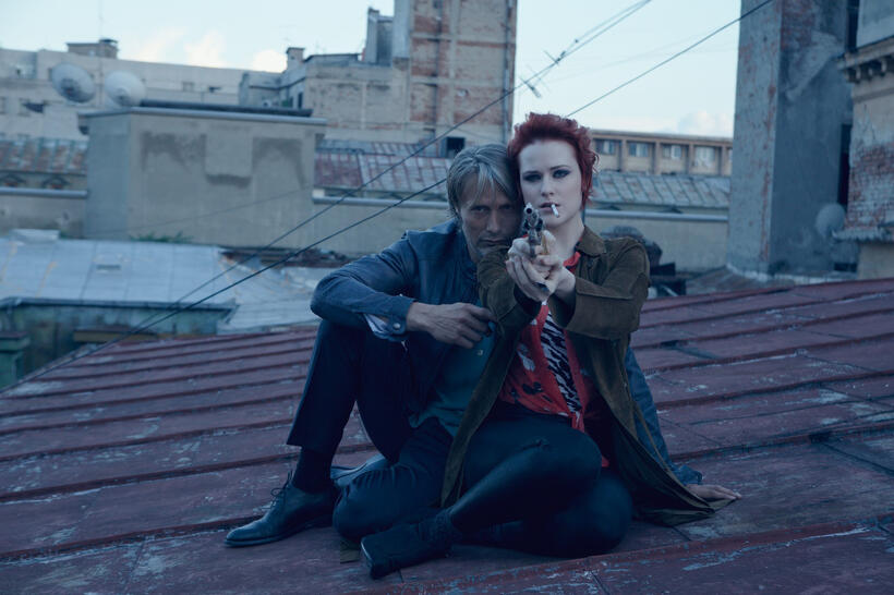 Mads Mikkelsen as Nigel and Evan Rachel Wood as Gabi Ibanescu in "Charlie Countryman."