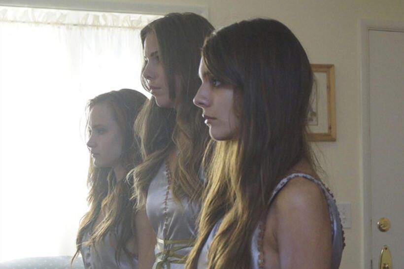 Amanda Grace Cooper as Hanna Popkin, Reanin Johannink as Martha Popkin and Caitlin Stasey as Maddy Killian in the horror comedy “ALL CHEERLEADERS DIE"
