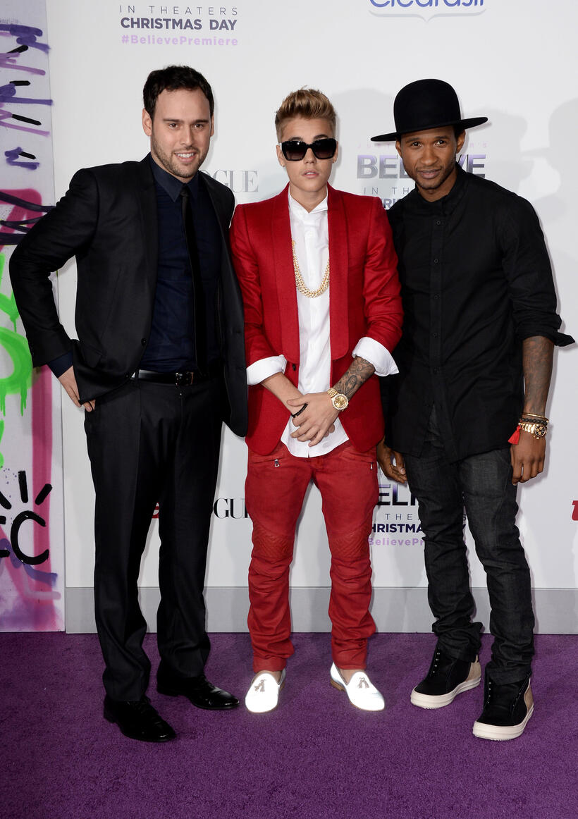 Producer Scooter Braun, Justin Bieber and producer Usher at the World premiere of "Justin Bieber's Believe."