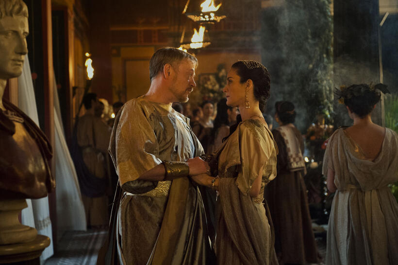 Jared Harris as Severus and Carrie-Anne Moss as Aurelia in "Pompeii."