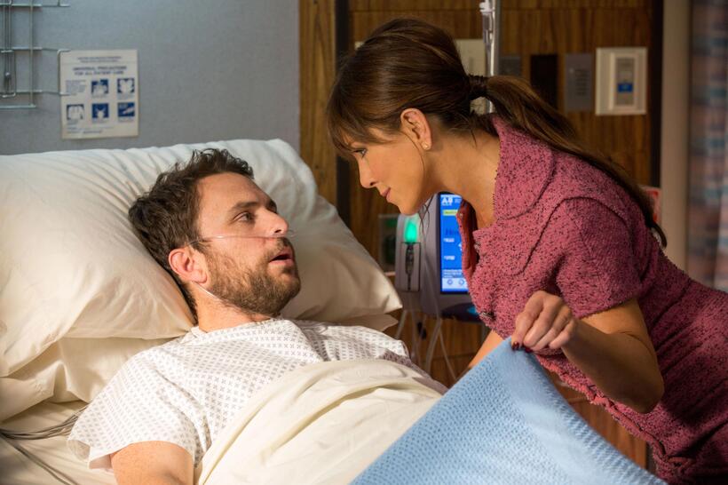 Charlie Day as Dale Arbus and Jennifer Aniston as Dr. Julia Harris in "Horrible Bosses 2."