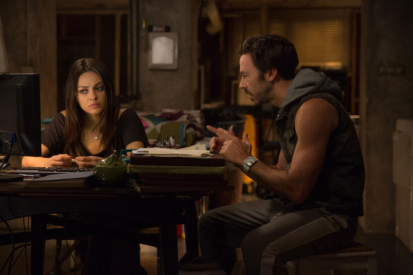 Mila Kunis as Jupiter Jones and Kick Gurry as Vladie in "Jupiter Ascending."