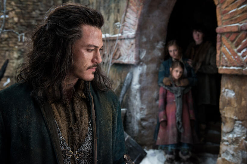 Luke Evans as Bard, Mary Nesbitt as Tilda, Peggy Nesbitt as Sigrid and John Bell as Bain in "The Hobbit: The Battle of the Five Armies."
