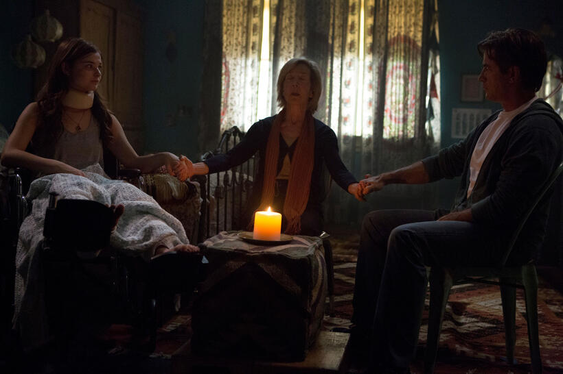 Stefanie Scott as Quinn Brenner, Lin Shaye as Elise Rainier and Dermot Mulroney as Sean Brenner in "Insidious: Chapter 3."