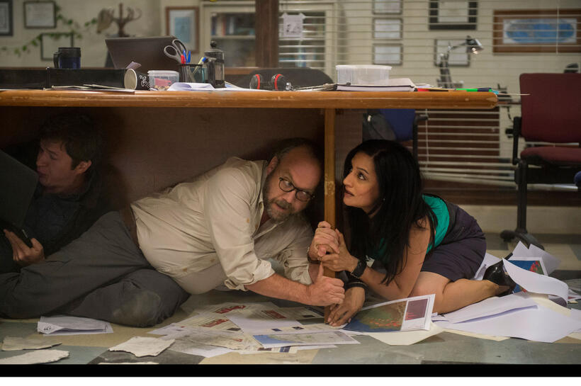 Paul Giamatti as Lawrence and Archie Panjabi as Serena in "San Andreas."