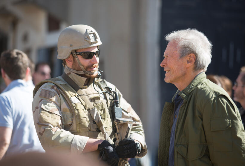 Producer Bradley Cooper and director/producer Clint Eastwood on the set of "American Sniper."