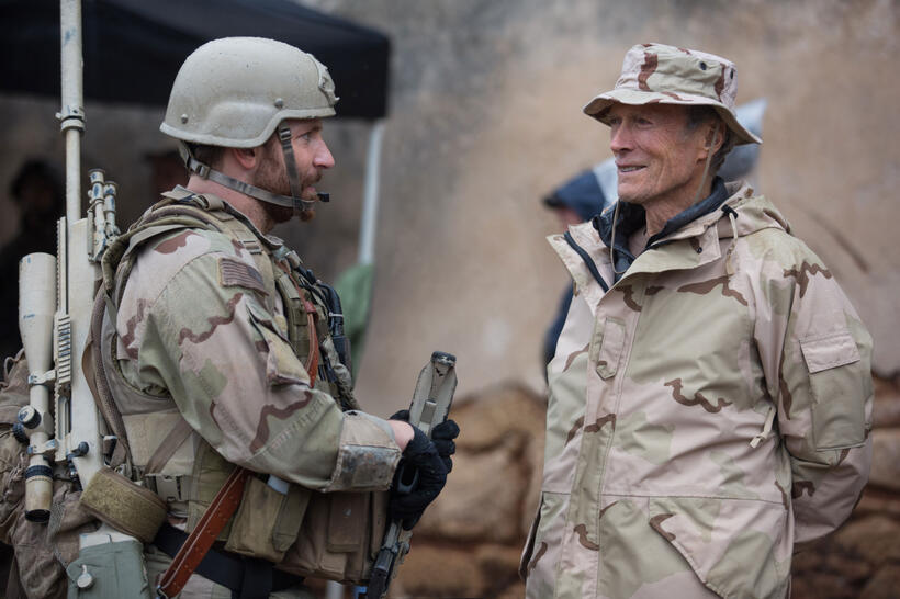 Producer Bradley Cooper and director/producer Clint Eastwood on the set of "American Sniper."