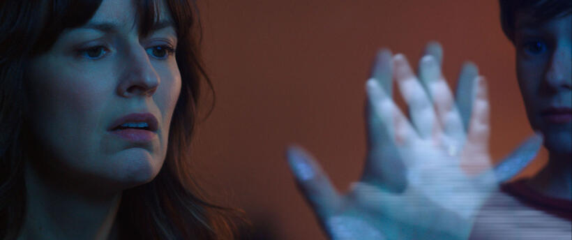 Rosmarie DeWitt as Amy Bowen and Kyle Catlett as Griffin in "Poltergeist."