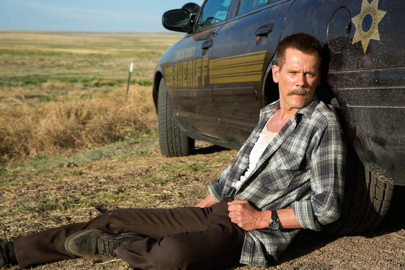 Kevin Bacon as Sheriff Kretzer in "Cop Car."