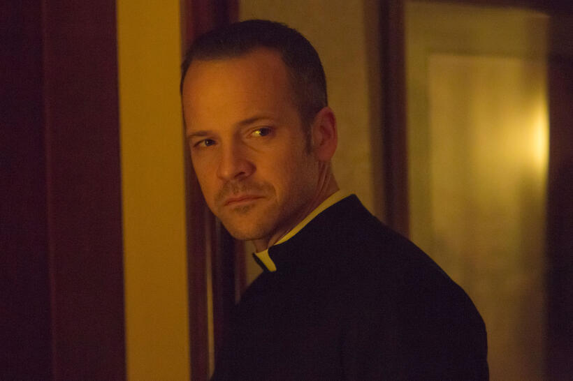 Peter Sarsgaard as Father Bill Lombardy in "Pawn Sacrifice."
