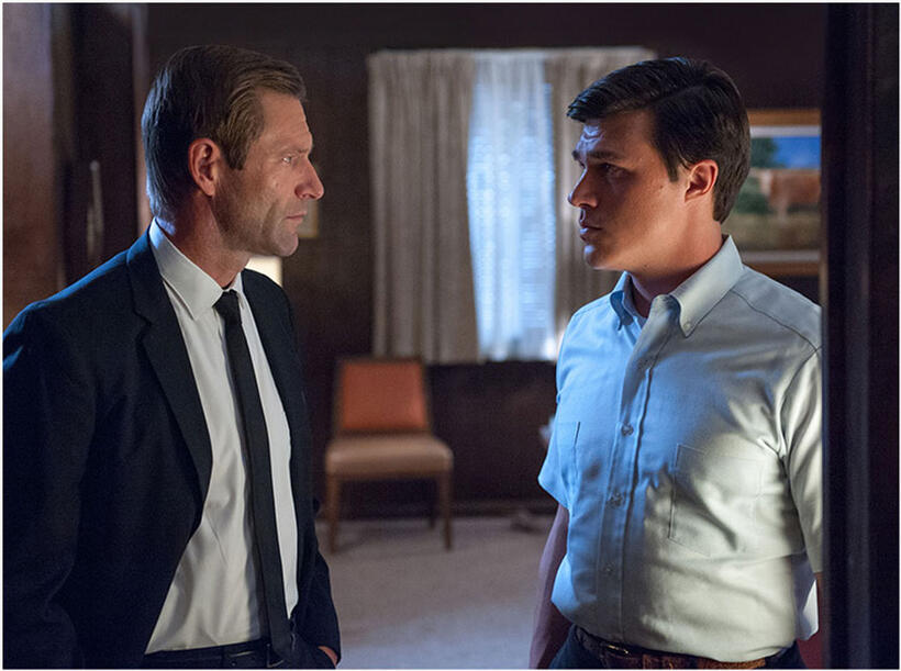 Finn Wittrock as Freddie Steinmark and Aaron Eckhart as Darrell Royal in "My All American."