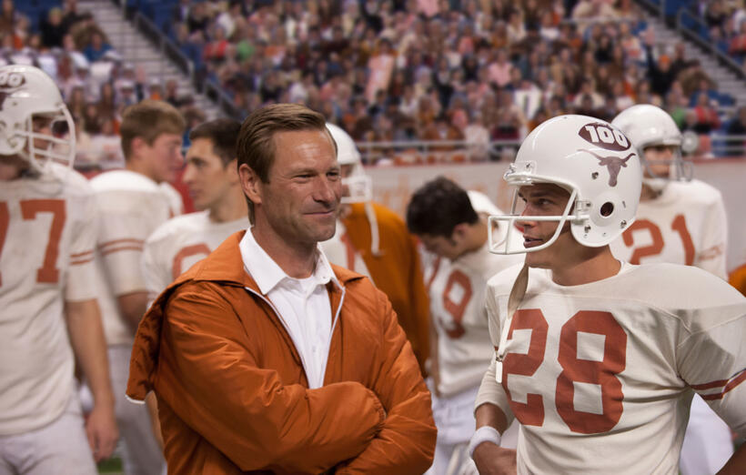 Aaron Eckhart as Darrell Royal and Finn Wittrock as Freddie Steinmark in "My All American."
