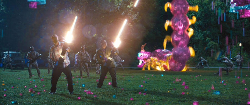 Adam Sandler as Sam Brenner and Josh Gad as Ludlow in "Pixels."