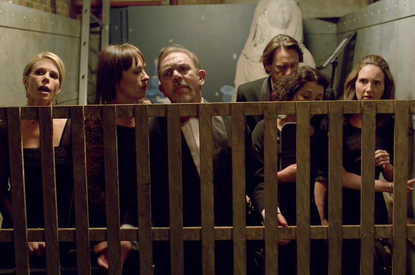Cheryl Hines as Dawn, Juliet Aubrey as Marta, David Bamber as Walt, Simon Chadwick as Evan, Amalia Vitale as Kendra and Jenny Oaks Baker as Mandy in "Christmas Eve."