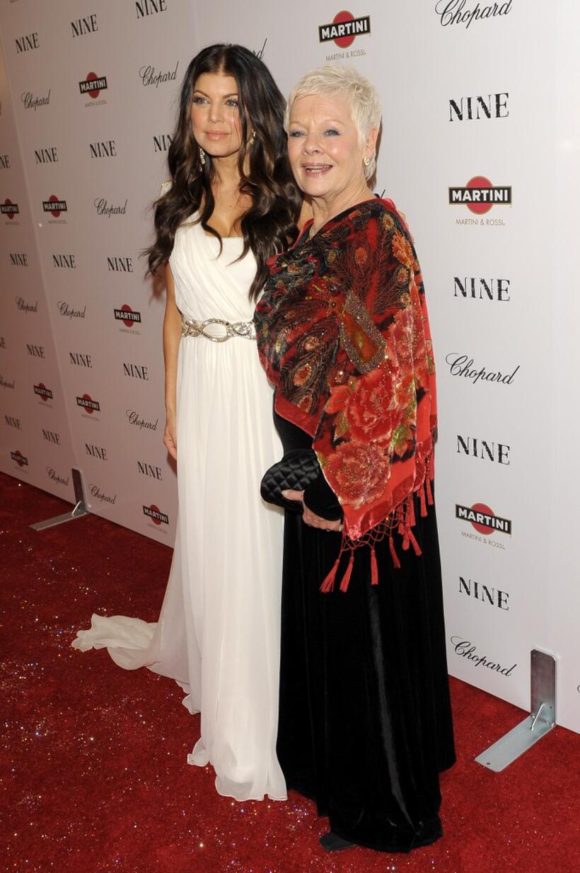 Singer Fergie and Dame Judi Dench at the New York premiere of "Nine."