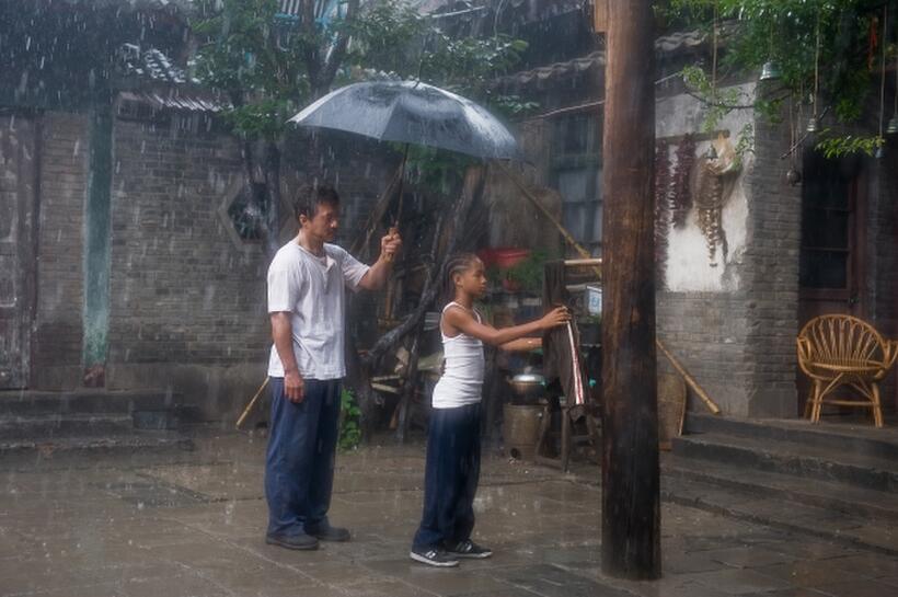 Jackie Chan as Mr. Han and Jaden Smith as Dre Parker in "The Karate Kid (2010)."