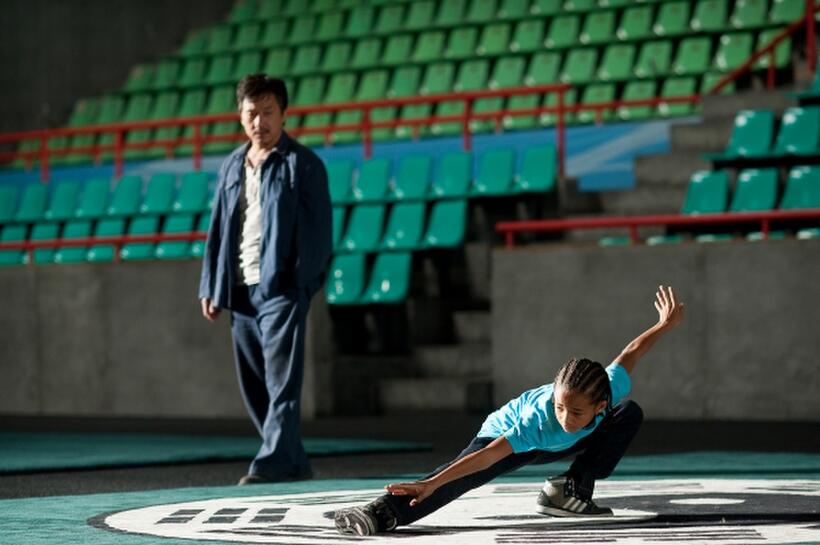 Jackie Chan as Mr. Han and Jaden Smith as Dre Parker in "The Karate Kid (2010)."