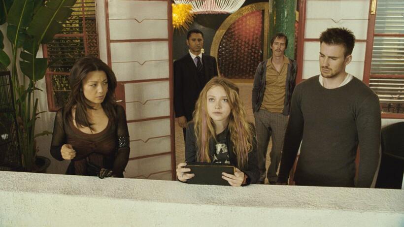 Ming-na, Dakota Fanning and Chris Evans in "Push."