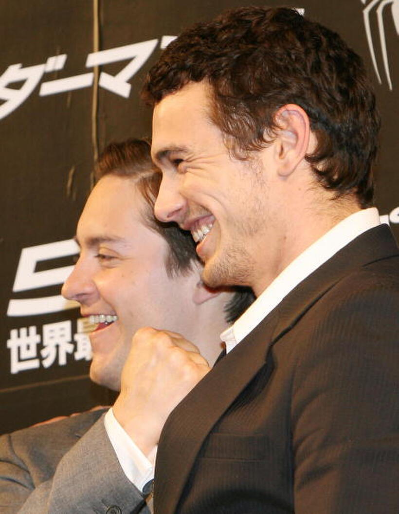 "Spider-Man 3" stars Tobey Maguire and James Franco promote the film at a press conference in Tokyo.