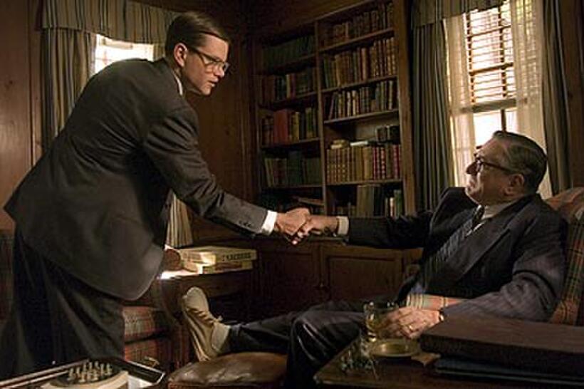 Matt Damon greets Robert De Niro in "The Good Shepherd."