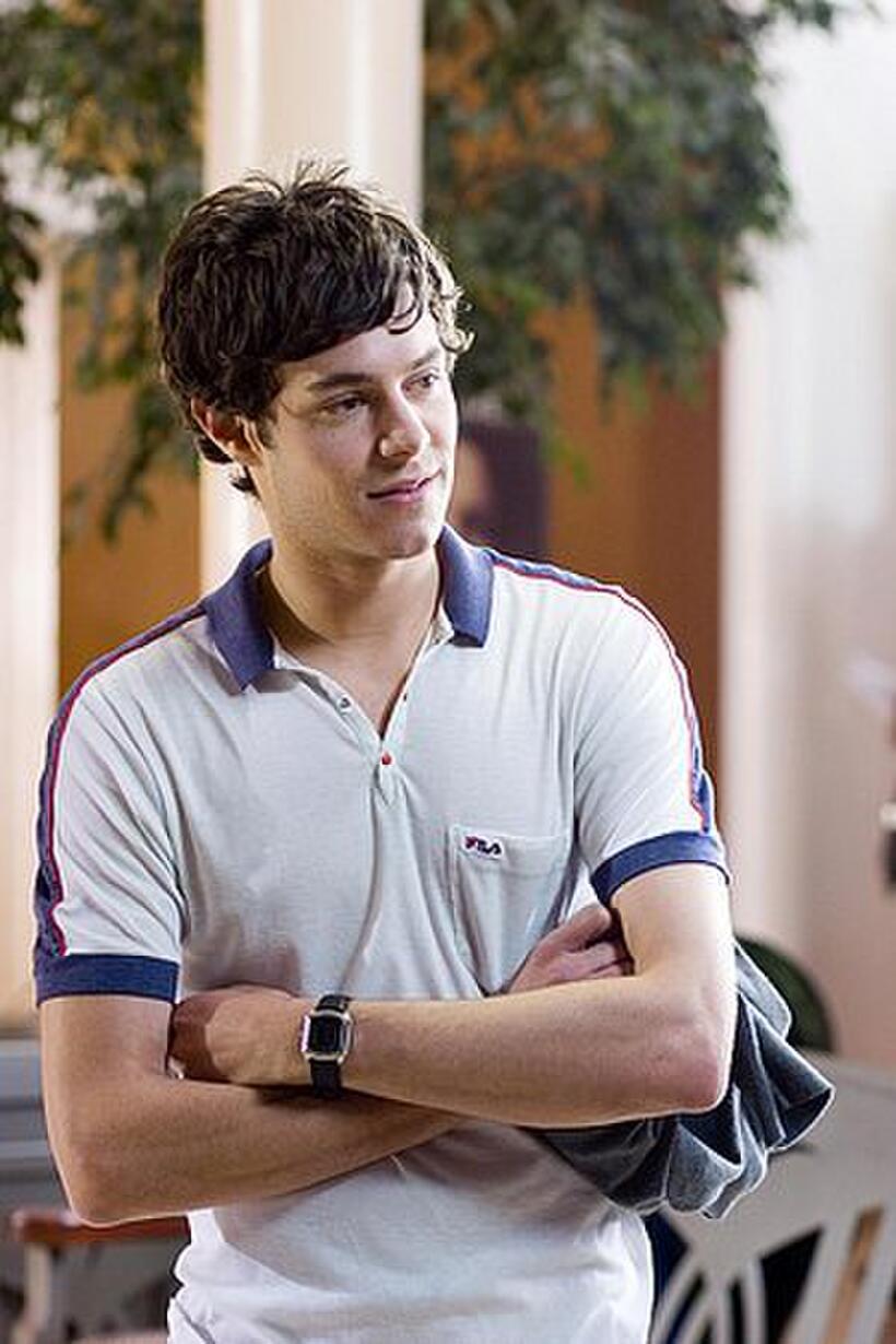 Adam Brody as Carter, who is heartbroken after his girlfriend dumps him, in "In the Land of Women."