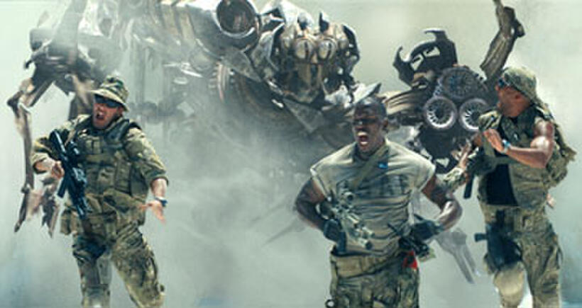 Epps (Tyrese Gibson) runs from Scorponok's attack in "Transformers."