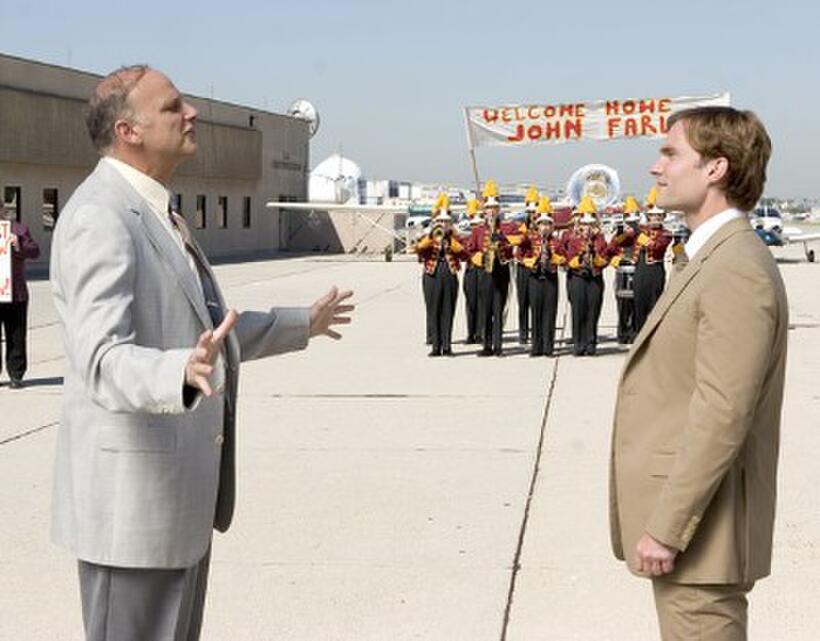 John Farley (Seann William Scott), right, gets a hometown welcome from the band in "Mr. Woodstock."